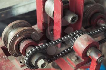 Industrial equipment, close up fragment with chain belt