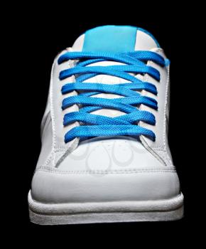 Blue sport shoe isolated on black background