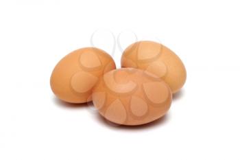 Three eggs isolated on white