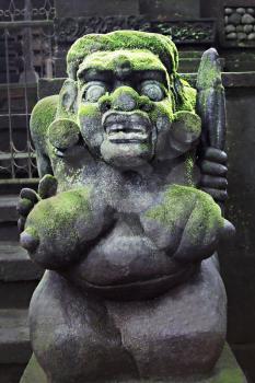 BALI, INDONESIA - FEBRUARY 22: Ornate monster statue at Ulun Danu temple on February, 22, 2011, Bali, Indonesia