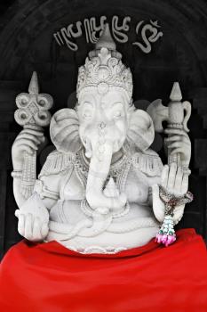 BALI, INDONESIA - FEBRUARY 26: White Ganesha statue at Ulun Danu temple on February, 26, 2011, Bali, Indonesia. Ganesha is a most powerful hindu god. 