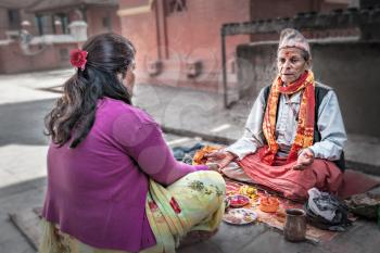 KATHMANDU, NEPAL - APRIL 16: Brahmin make puja ceremony on April, 16, 2012, Kathmandu, Nepal.