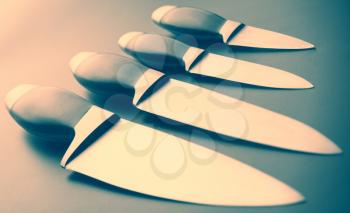 Set of professional kitchen knives. Toned
