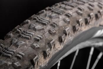 Muddy tire of a mountain bicycle