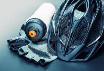 Helmet, gloves and water bottle - bicycle accessories