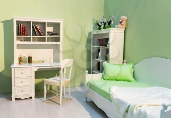 Spacious child room in a green color