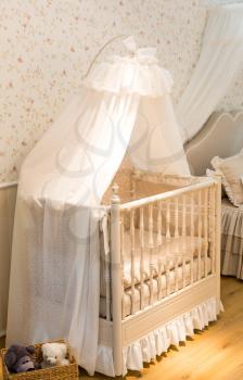 Wooden baby cot with curtain