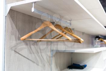 Empty hangers for clothes in the dressing room