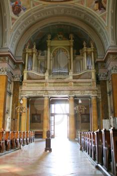 Giant organ in old Church. Door is open - Welcome