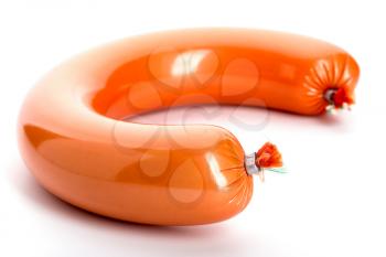 Boiled sausage. Isolated over white background. Tasty food.