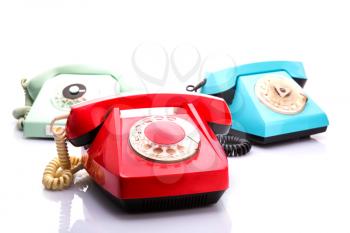 Set of vintage telephones isolated on white background