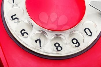 Macro of dial of old red telephone