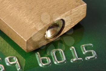 Close-up view of credit card and padlock