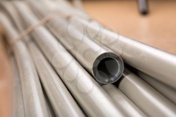 Closeup view of plastic pipes pile