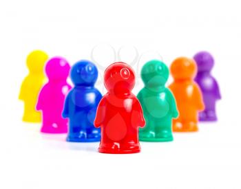 Leadership - colorful toy people group with leader in front of
