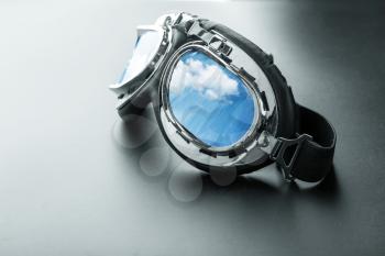 Pilot glasses with sky reflection