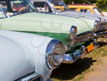 Close up of the line of retro cars parked