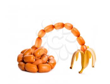 Sausages pile in banana's peel isolated over white background