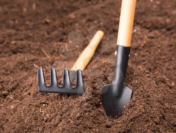 Garden Tools on Soil with Copy Space