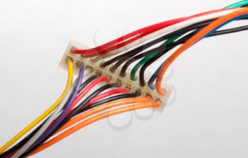 Close-up of electrical plug with colorful cables