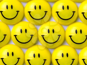 Background of many yellow smileys