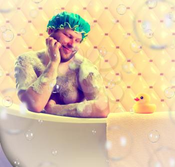 Romantic dreamer taking bath with toy duck