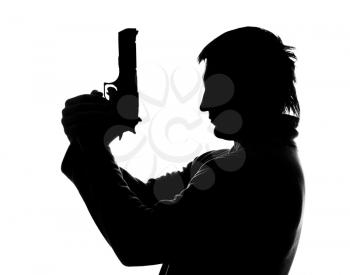 Silhouette of man with gun shooting. Isolated on white