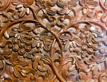 Carved pattern on wood, element of decoration