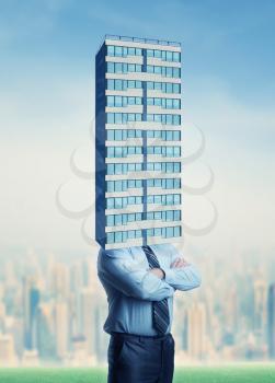 Businessman with high skyscraper instead of head
