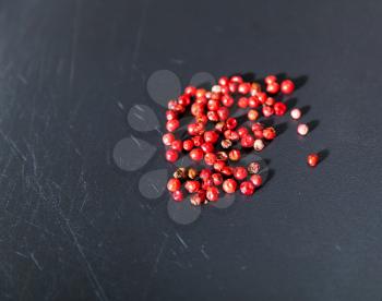 Dried red berries on the table