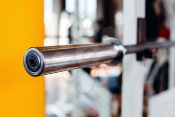 Close up of bar-bell handle in the gym
