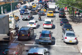 Traffic car jam congestion on city street in USA.