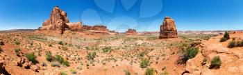 Landscape of  Arches National Park panoramic view.  Blue skyline on background.