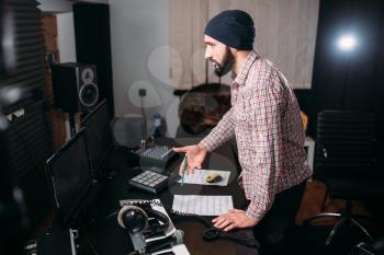 Sound engineer work with record in music studio. Audio engineering