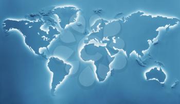 Illuminated earth map toned in blue. Continents shapes with cool white backlight