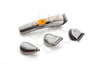 Electric hair, shaving, nose and ear wireless trimmer closeup, white background