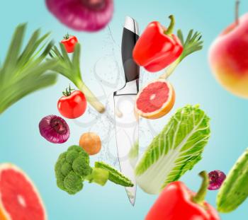 Kitchen knife and fresh vegetables, healthy lifestyle concept. Vegetarian cuisine, organic food cooking