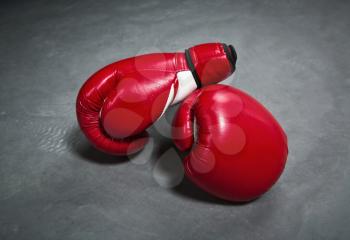 Red boxing gloves closeup. Fighting sport concept, box symbol