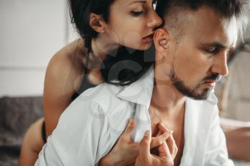 Sensuality of beautiful love couple, erotica. Erotic scene, sexual relationship of man and woman