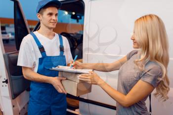 Deliveryman in uniform gives parcel to female customer at the car, delivery service. Man holding cardboard package near the vehicle, male deliver and woman, courier or shipping job