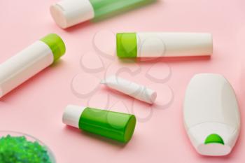 Skin care products, macro view, pink background, nobody. Morning healthcare procedures concept, hygiene tools