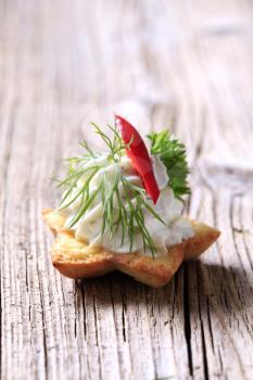 Pastry-based canape with savory spread 
