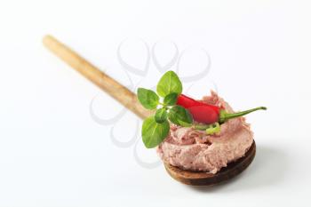 Liver pate on a wooden spoon - studio