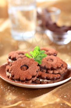 Chocolate sandwich cookies with cream filling - still life