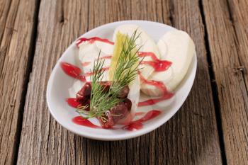 Mozzarella cheese with raspberry balsamic reduction
