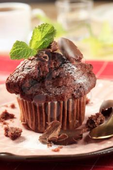 Delicious double chocolate muffin on pink plate