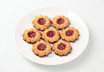 Chocolate dipped butter cookies with jelly center