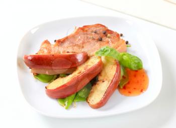 Pan fried belly pork and apple wedges