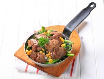 Pan-fried chicken livers with green beans and sweetcorn