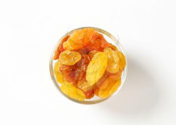 Sultana raisins in a small glass bowl